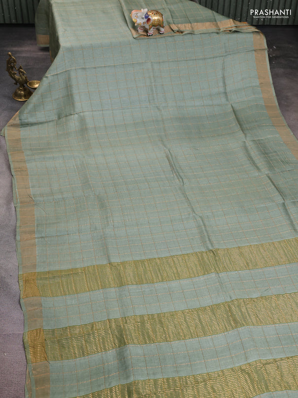 Pure tussar silk saree pastel green and purple shade with allover zari woven checked pattern and zari woven border