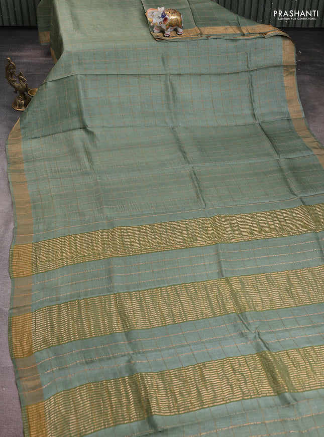 Pure tussar silk saree pastel green and black with allover zari woven checked pattern and zari woven border