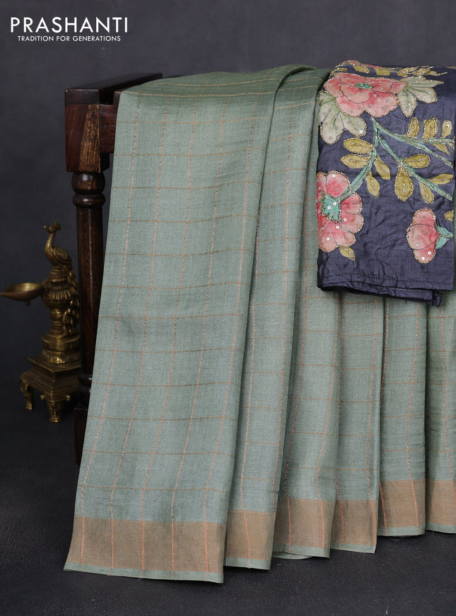 Pure tussar silk saree pastel green and black with allover zari woven checked pattern and zari woven border
