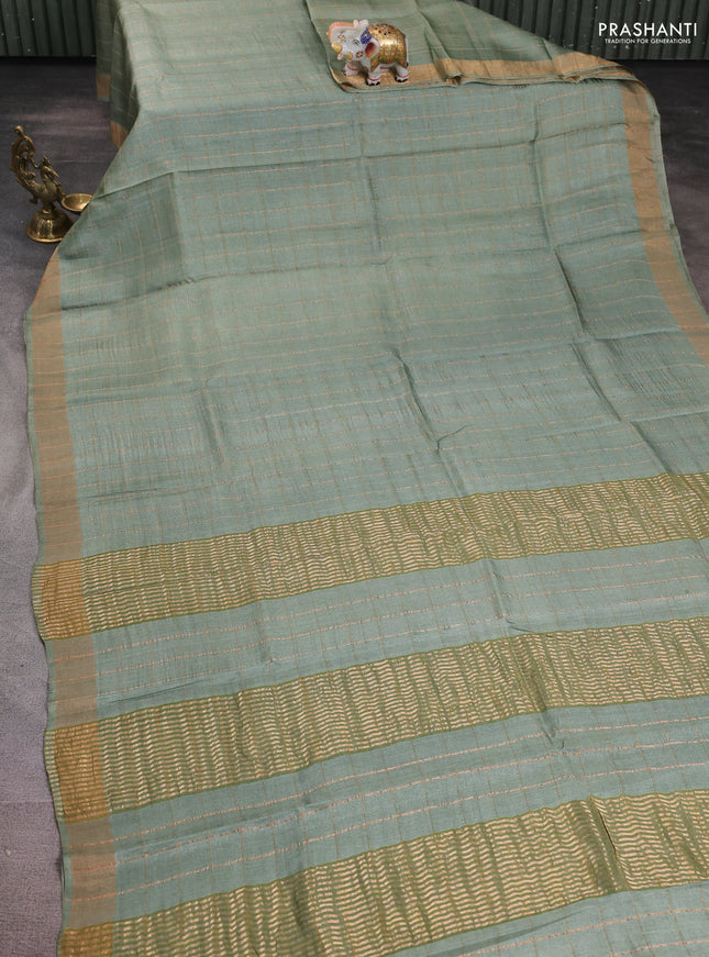 Pure tussar silk saree pastel green and black with allover zari woven checked pattern and zari woven border
