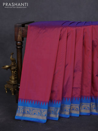 10 Yards kanchipuram silk saree dual shade of maroon and cs blue with plain body and elephant zari woven border