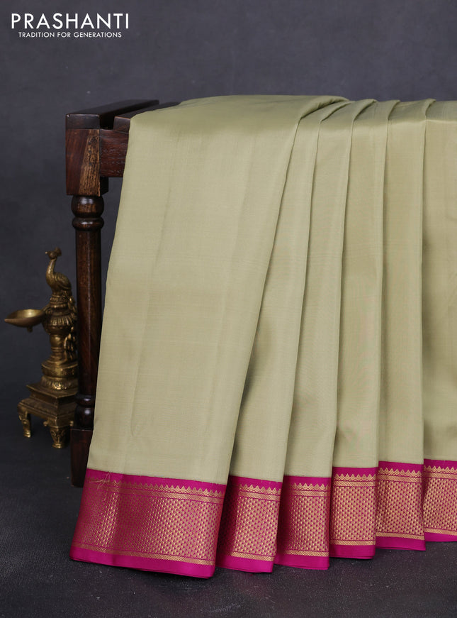 10 Yards pure kanchipuram silk saree elaichi green and magenta pink with plain body and zari woven korvai border
