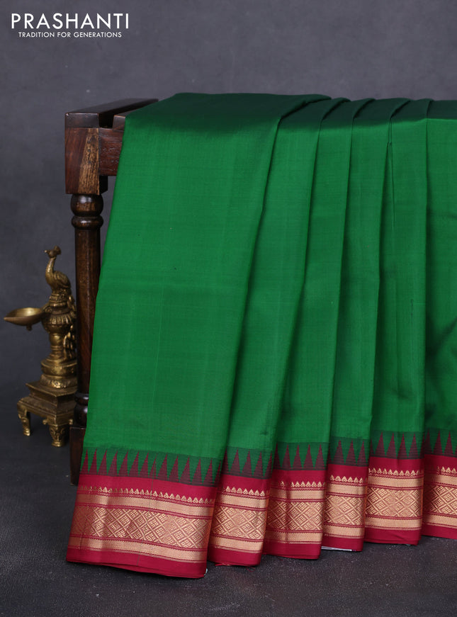 10 Yards pure kanchipuram silk saree green and maroon with plain body and temple design zari woven korvai border