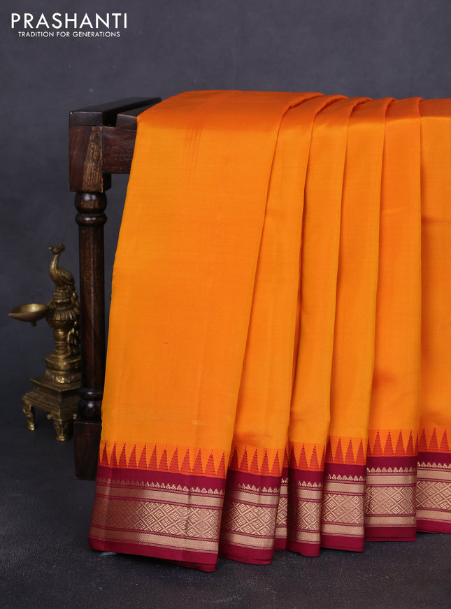 10 Yards pure kanchipuram silk saree mango yellow and maroon with plain body and temple design zari woven korvai border