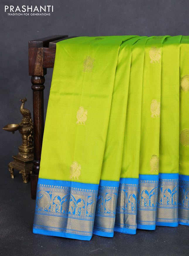 10 Yards pure kanchipuram silk saree light green and cs blue with annam & paisley zari woven buttas and rich zari woven korvai border