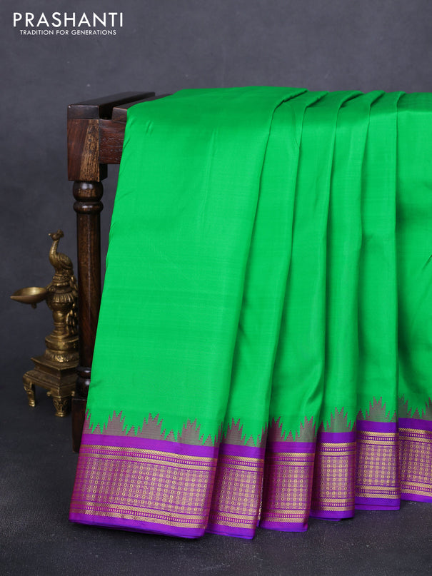 10 Yards pure kanchipuram silk saree green and purple with plain body and temple design zari woven korvai border