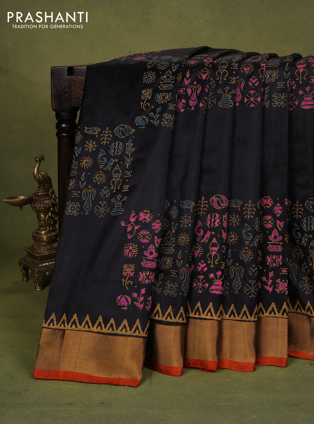 Uppada block printed silk saree black and dual shade of pinkish orange with allover butta prints and zari woven border