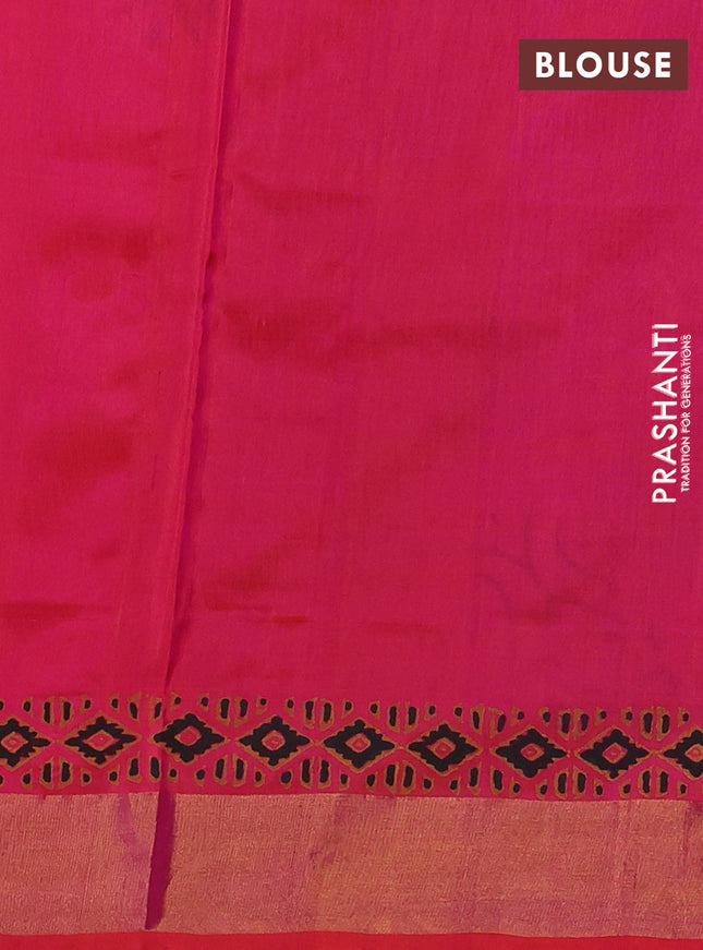 Uppada block printed silk saree black and dual shade of pinkish orange with allover butta prints and zari woven border