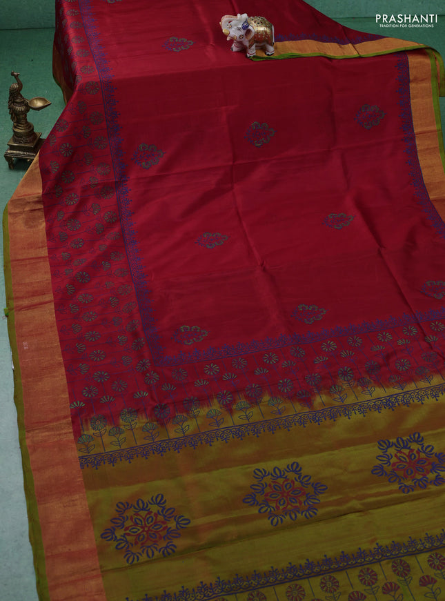 Uppada block printed silk saree red and dual shade of greenish orange with floral butta prints and zari woven border
