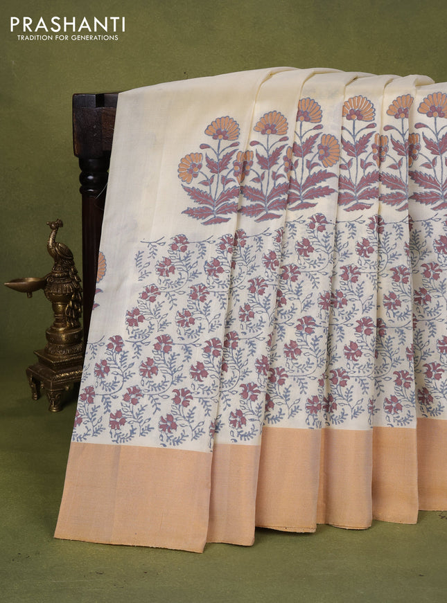 Uppada block printed silk saree cream with floral prints and ganga jamuna border