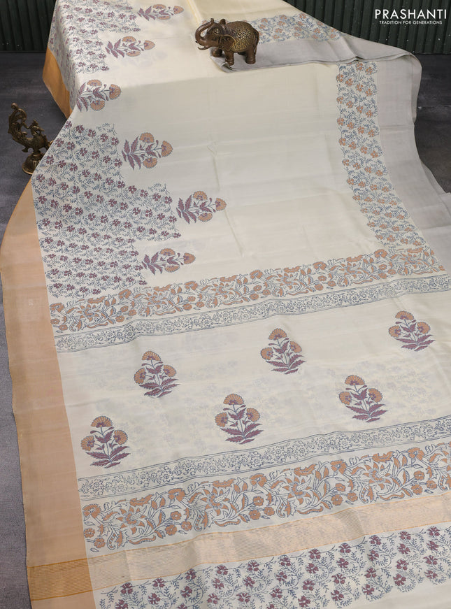Uppada block printed silk saree cream with floral prints and ganga jamuna border