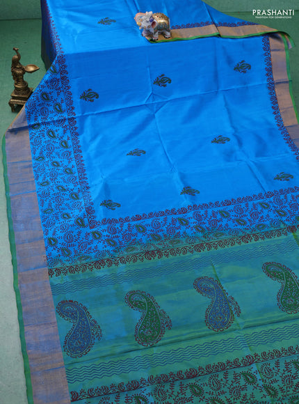 Uppada block printed silk saree cs blue and light green with paisly prints and zari woven border