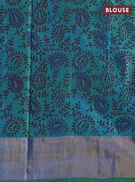 Uppada block printed silk saree cs blue and light green with paisly prints and zari woven border