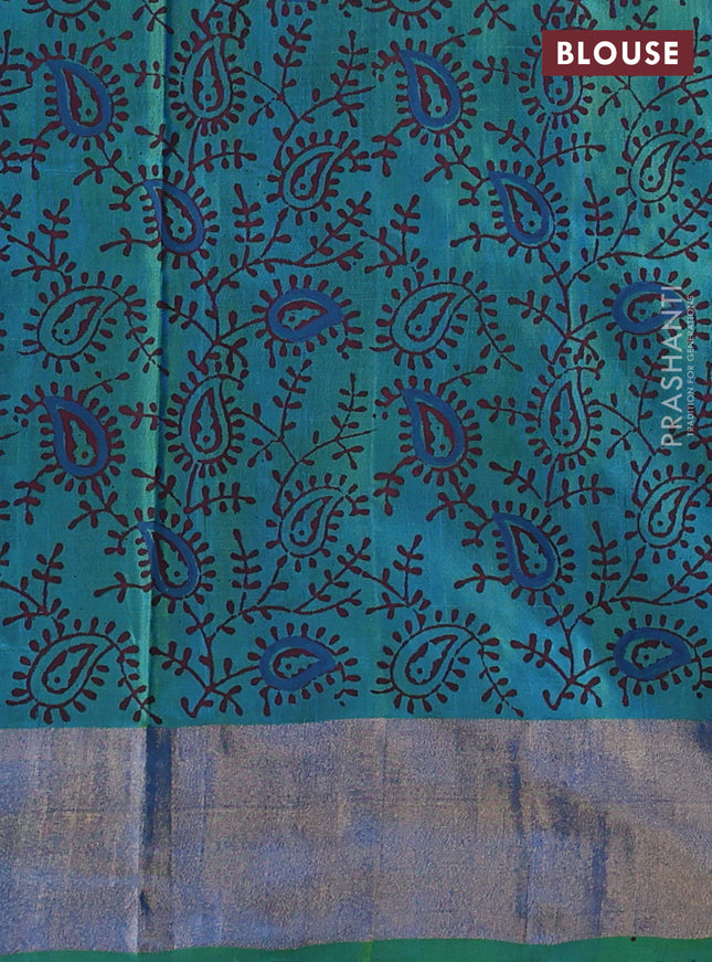 Uppada block printed silk saree cs blue and light green with paisly prints and zari woven border