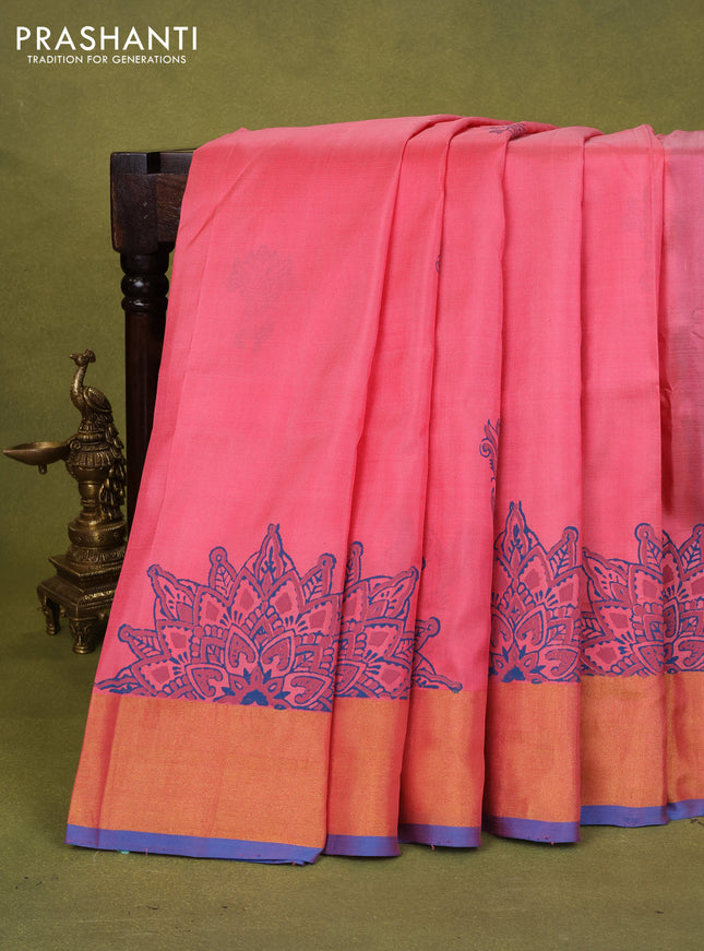Uppada block printed silk saree peach pink and cs blue with floral prints and zari woven border