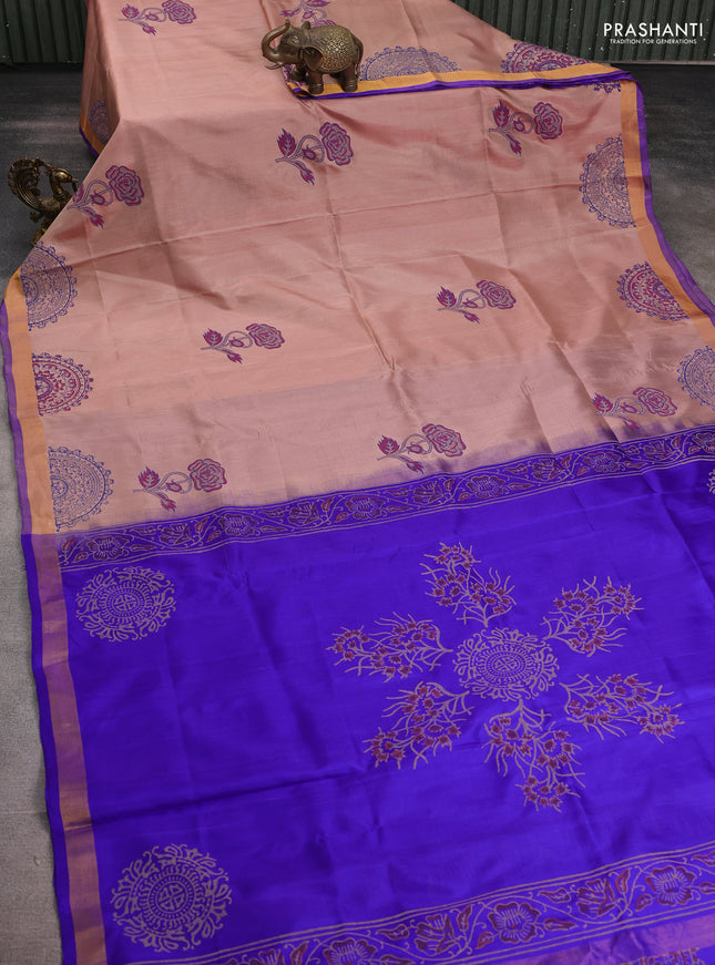 Uppada block printed silk saree beige and blue with floral prints and zari woven border