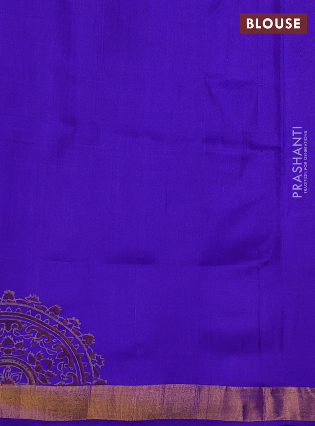 Uppada block printed silk saree beige and blue with floral prints and zari woven border