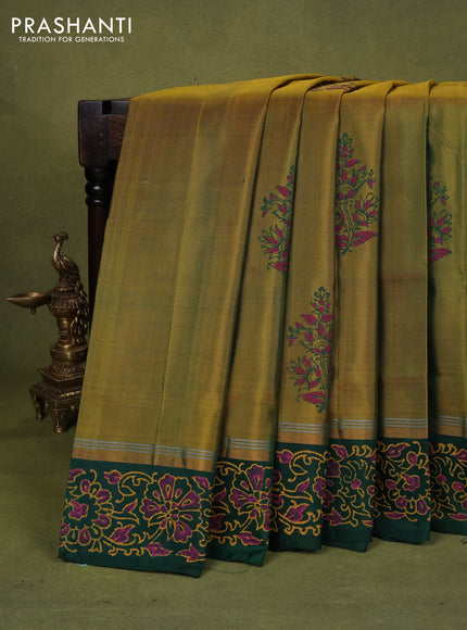 Uppada block printed silk saree dual shade of green and green with floral prints and zari woven border