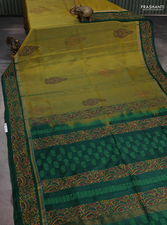 Uppada block printed silk saree dark mustard and green with floral butta prints and zari woven printed border
