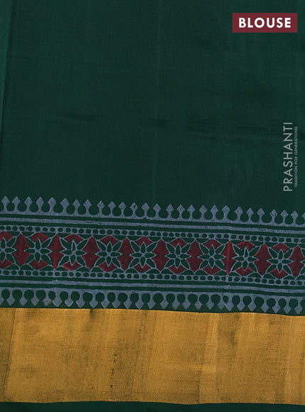 Uppada block printed silk saree grey and green with allover floral butta prints and zari woven border