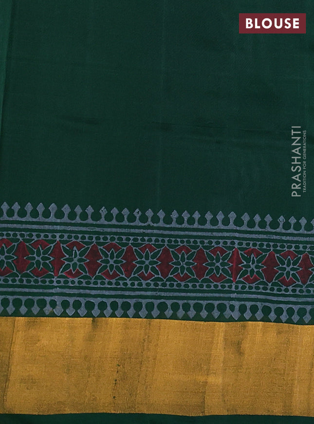 Uppada block printed silk saree grey and green with allover floral butta prints and zari woven border
