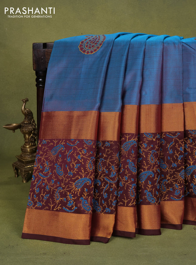 Uppada block printed silk saree peacock blue and brown with paisly prints and long rettapet zari woven printed border