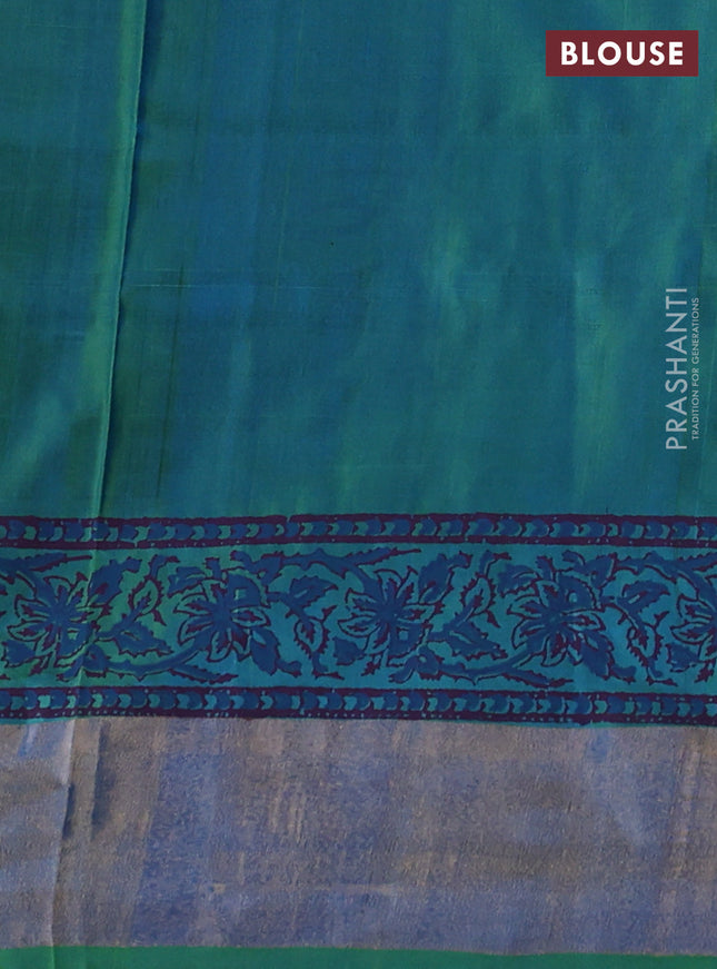Uppada block printed silk saree cs blue and dual shade of green with allover floral butta prints and zari woven border