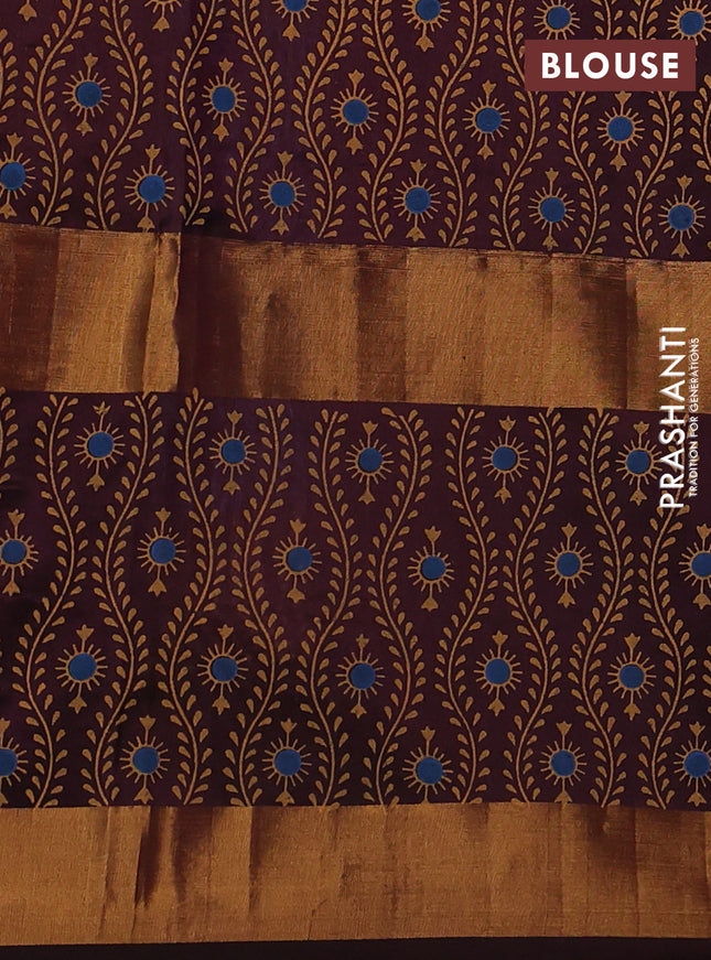 Uppada block printed silk saree peacock blue and brown with floral butta prints and long rettapet zari woven printed border
