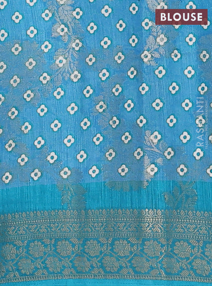 Semi dola saree teal green with allover zari weaves & floral prints and zari woven border
