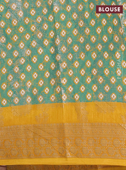 Semi dola saree mustard yellow with allover zari weaves & floral prints and zari woven border