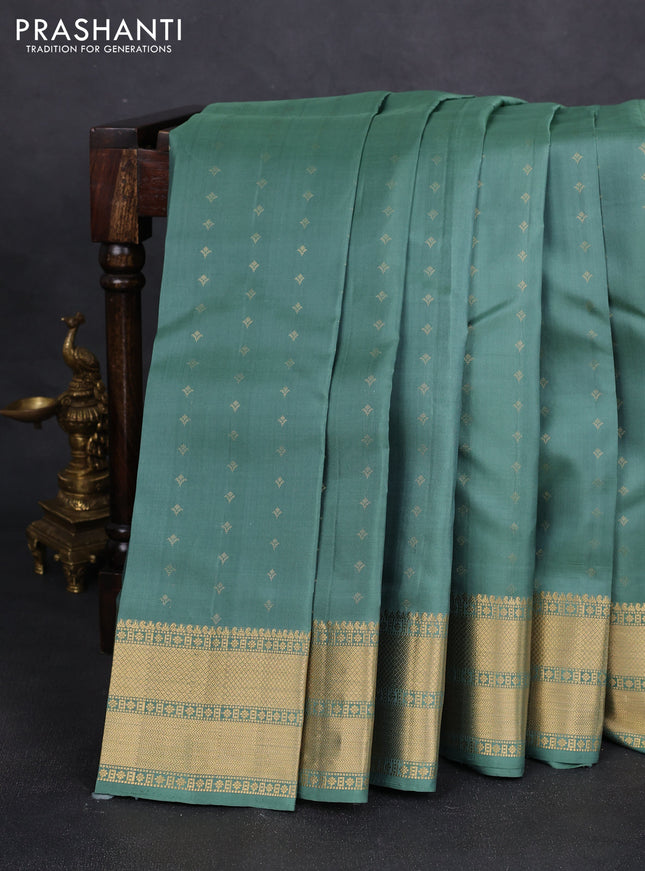 Pure soft silk saree pastel green with allover zari woven buttas and zari woven border