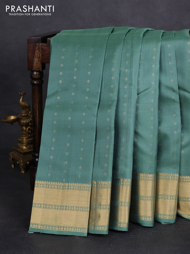 Pure soft silk saree pastel green with allover zari woven buttas and zari woven border