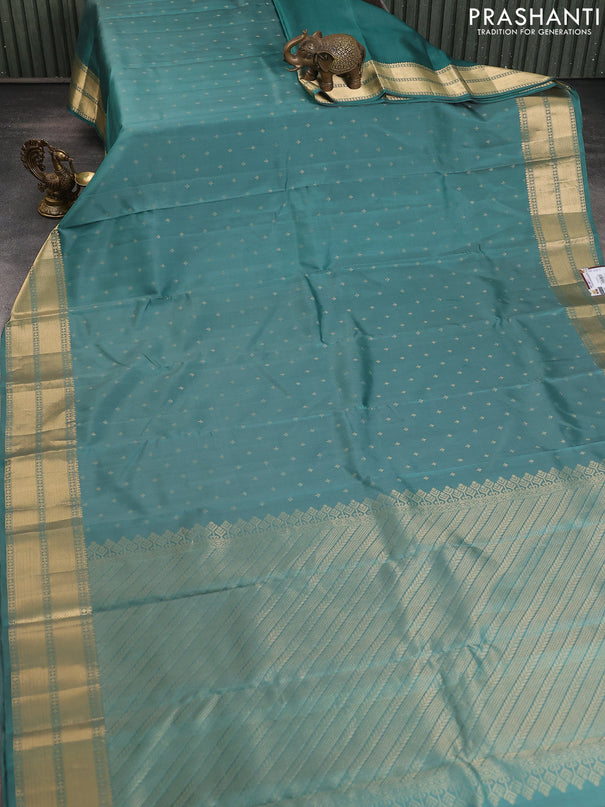 Pure soft silk saree pastel green shade with allover zari woven buttas and zari woven border
