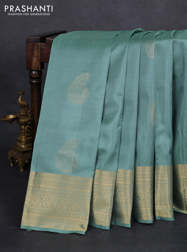 Pure soft silk saree pastel green with paisley zari woven buttas and zari woven border