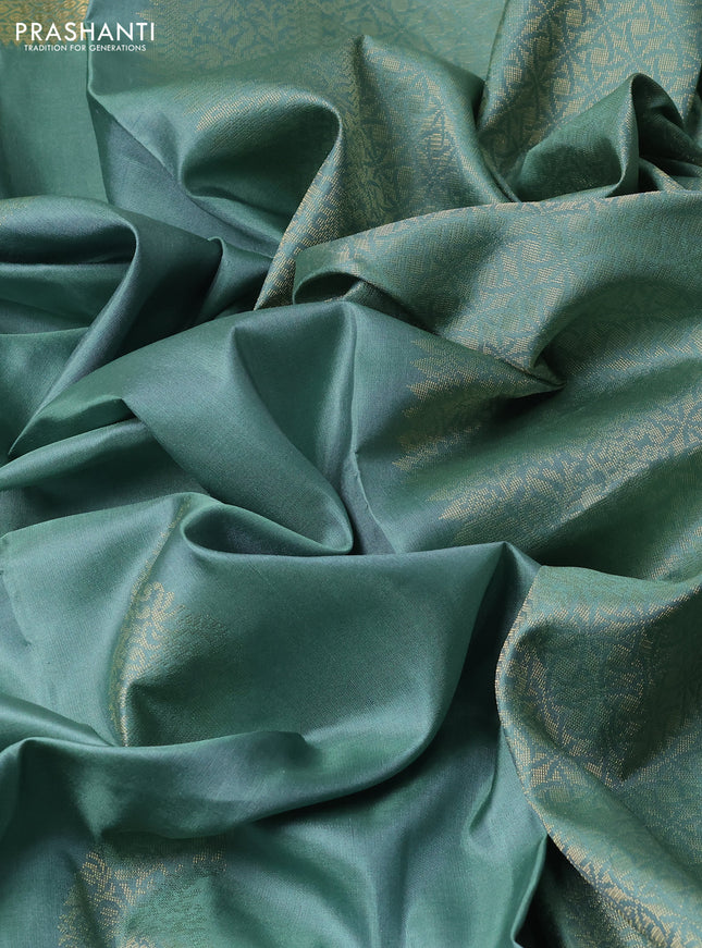 Pure soft silk saree pastel green with paisley zari woven buttas and zari woven border