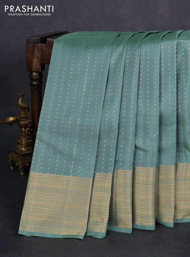 Pure soft silk saree pastel green with allover zari woven buttas and zari woven border