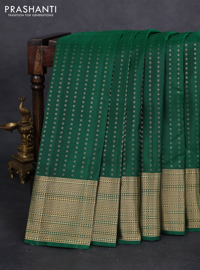 Pure soft silk saree bottle green with allover zari woven buttas and zari woven border
