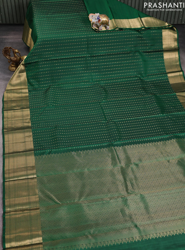 Pure soft silk saree bottle green with allover zari woven buttas and zari woven border