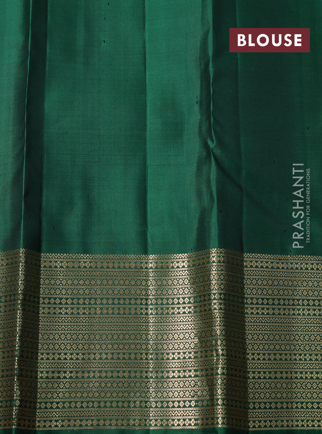 Pure soft silk saree bottle green with allover zari woven buttas and zari woven border