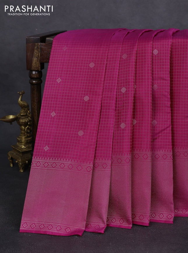 Pure soft silk saree pink and  with allover silver zari checked pattern and silver zari woven border