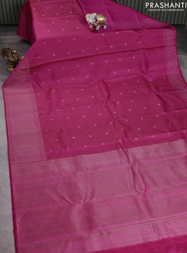 Pure soft silk saree pink and  with allover silver zari checked pattern and silver zari woven border