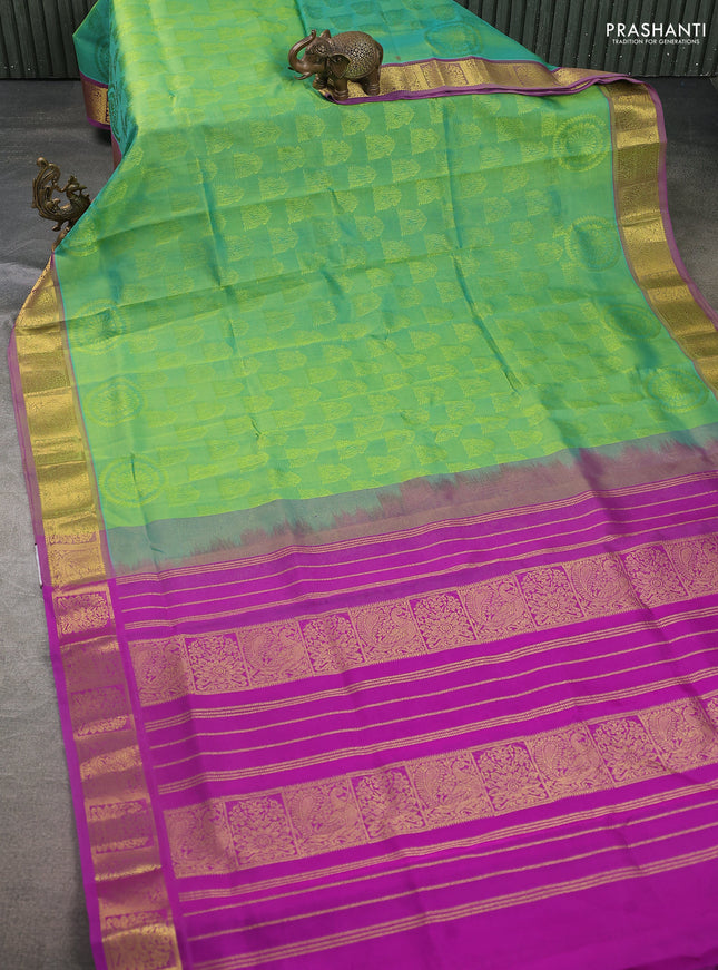 Silk cotton saree dual shade of green and magenta pink with allover self emboss jacquard and annam zari woven border