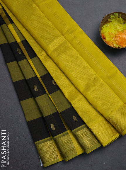Silk cotton saree black and yellow with allover paalum pazhamum checks pattern & paisley zari buttas and zari woven border