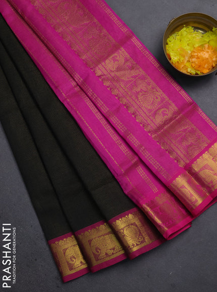 Silk cotton saree black and magenta pink with allover vairosi pattern and annam & elephant zari woven border