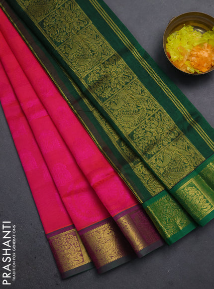 Silk cotton saree dual shade of pinkish orange and green with allover self emboss jacquard and zari woven border