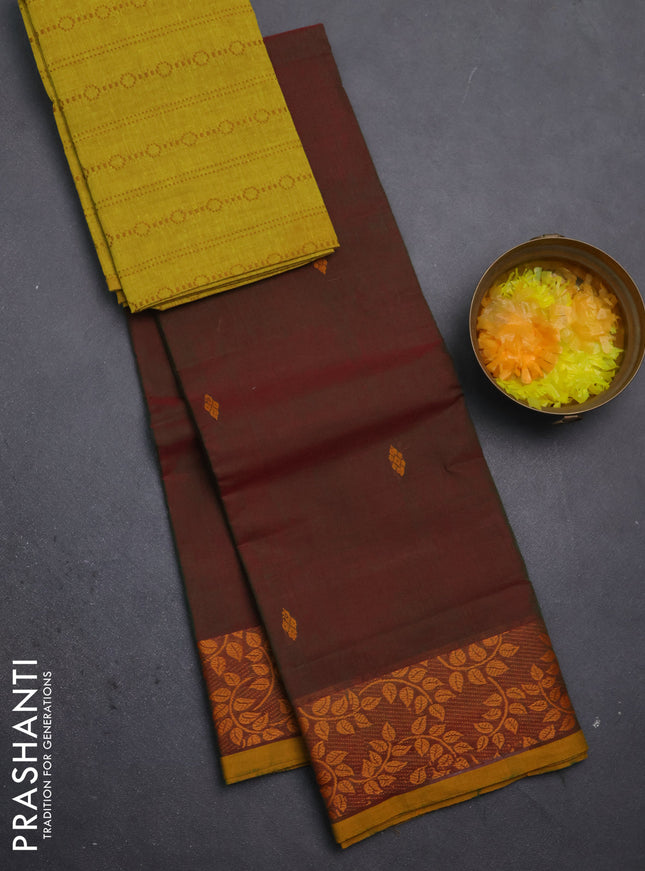 Chettinad cotton saree dual shade of greenish maroon and dark mustard and thread woven buttas and thread woven border