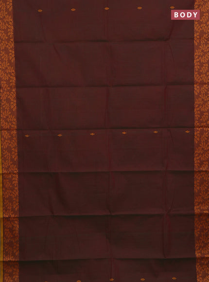 Chettinad cotton saree dual shade of greenish maroon and dark mustard and thread woven buttas and thread woven border
