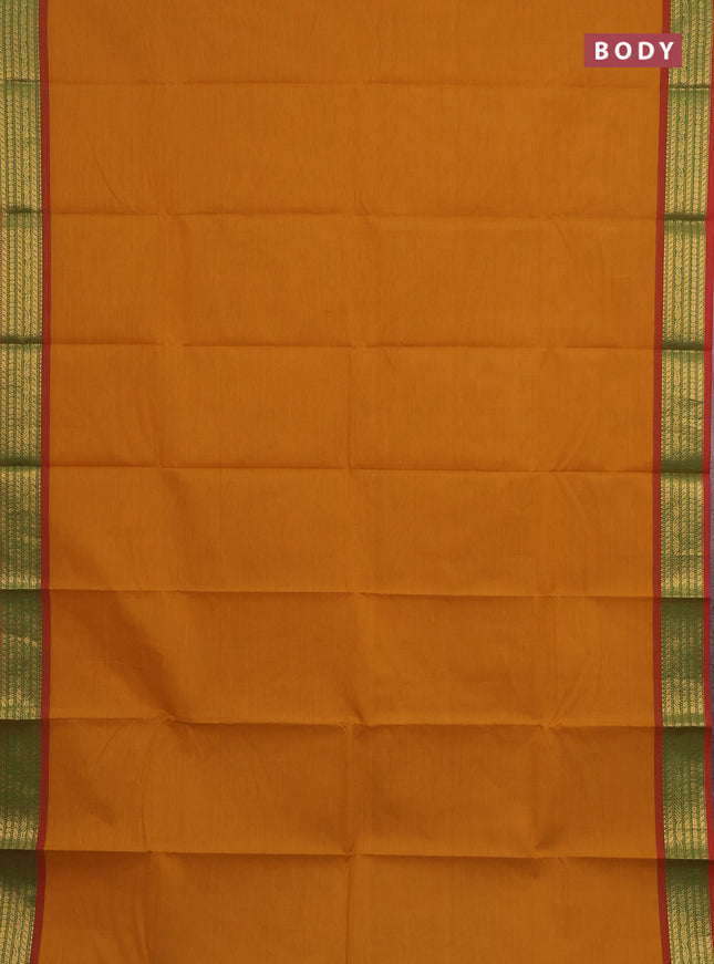 Chettinad cotton saree dark mustard and rustic orange with plain body and zari woven border