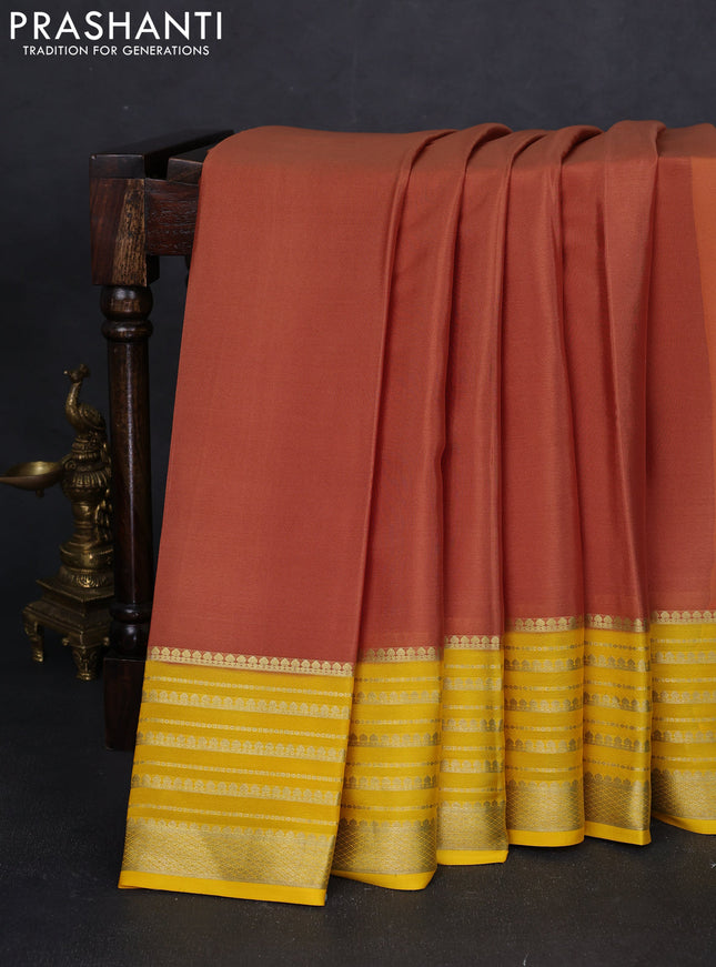 Pure mysore silk saree rust shade and yellow with plain body and long zari woven border