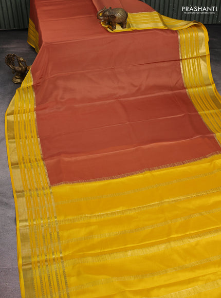 Pure mysore silk saree rust shade and yellow with plain body and long zari woven border